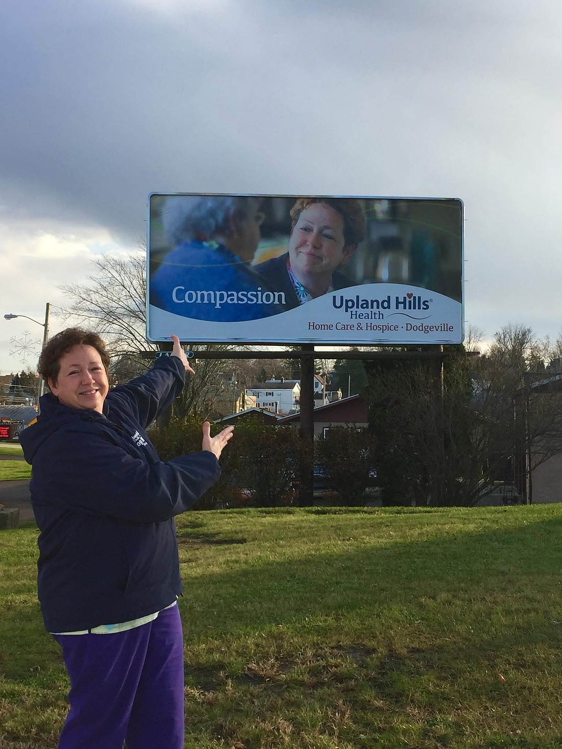 Pam Spurley, who retired last week after 31 years as a certified nursing assistant and 22 years as volunteer coordinator for Upland Hills Health (UHH) Hospice, along with home care, was featured on a past UHH billboard.